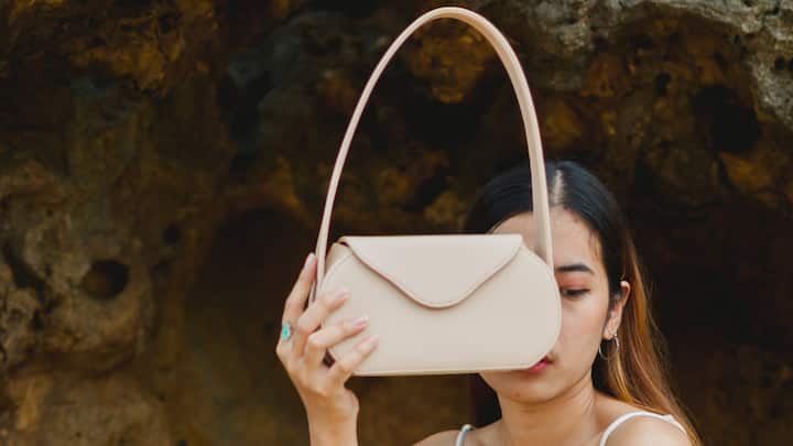 Vegan leather has become a fashionable and moral substitute for traditional leather in handbags, a classic piece of accessories. Here's how you can style it for every occasion.