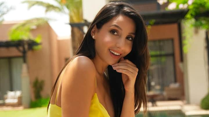 Nora Fatehi is treating fans and followers to her stunning pictures on Instagram. Nora can be seen posing by the pool side.