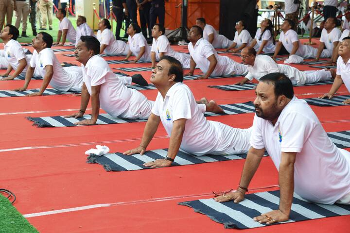 Assam Chief Minister Himanta Biswa Sarma, state minister Keshab Mahanta and others perform yoga on the 10th International Day of Yoga at Tezpur, in Sonitpur district. (Image Source: PTI)