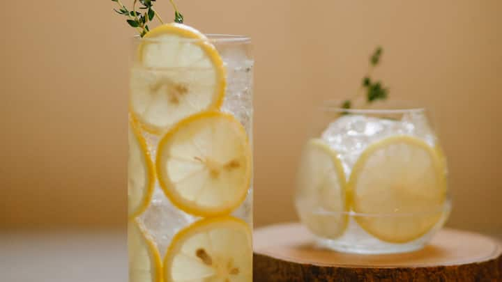 1. Start Your Day with Warm Water and Lemon First thing in the morning, sip a glass of warm water with freshly squeezed lemon juice to help jumpstart your metabolism and cleanse your body. This easy exercise can help clear your digestive tract and get your body ready for a day of nutritious food and yoga. (Image Source: Canva)