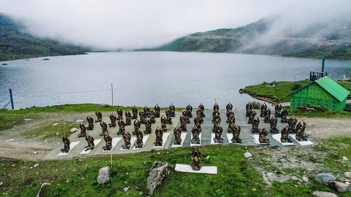 Indian Army personnel perform yoga on the 10th International Day of Yoga, in Sikkim.