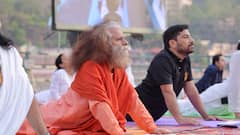 IN Pics: योग दिवस के मौके पर ऋषिकेश में गंगा के किनारे विदेशियों ने किया योग, देखे तस्वीरें