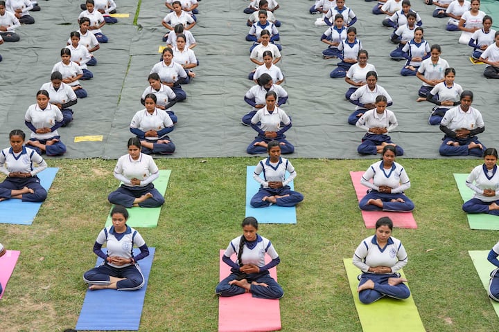 NCC cadets perform yoga on the 10th International Day of Yoga, in Purba Bardhaman district. (Image Source: PTI)