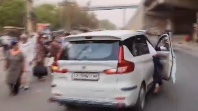Traffic police Faridabad Haryana driver drags police officer Watch: Traffic Cop Dragged By Drunk Driver In Haryana's Faridabad, Video Goes Viral