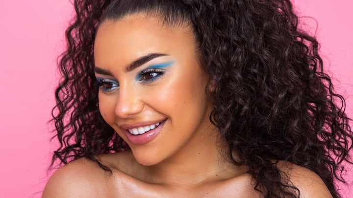 A waterproof liquid liner will prevent any smudging on rainy days. (Image Source: Canva)