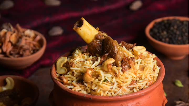 Gosht Atterachi Biryani is a fragrant and richly spiced biryani made with tender marinated mutton, layered with aromatic basmati rice and saffron.  (Image source: Special Arrangements)