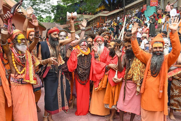 'Sadhus' take part in a religious procession at Kamakhya temple, on the eve of the annual Ambubachi Mela, in Guwahati. (Image Source: PTI)