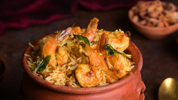 Keralian Cheemmeen Biryani is a coastal delight that features succulent prawns nestled in layers of aromatic rice, enriched with coconut milk, and a medley of traditional spices. (Image source: Special Arrangements)