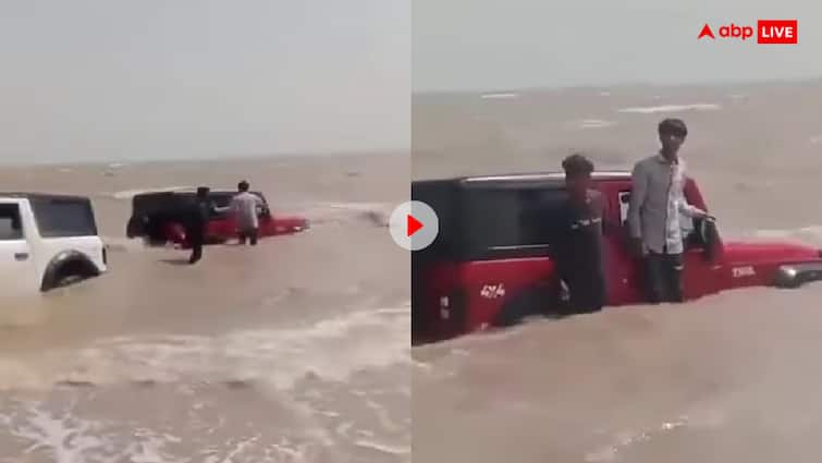Car of the boys doing stunts in the sea got stuck in the waves video goes viral Video: रील बनाने के चक्कर में लग गया 40 लाख का घाटा, उसके बाद हुई एफआईआर, देखें हैरान कर देने वाला वीडियो