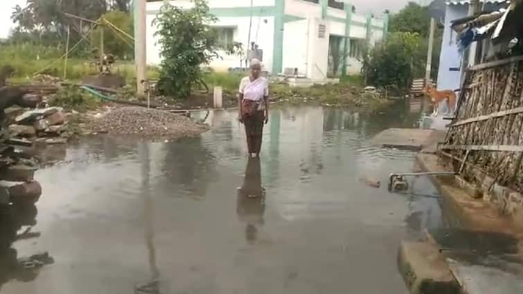 Coimbatore rain Floodwater surrounds residences due to heavy rains - TNN கோவை அருகே கனமழையால் குடியிருப்புகளை சூழ்ந்த வெள்ளநீர் ; பொதுமக்கள் கடும் அவதி