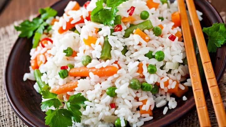 Rice contains a lot of carbohydrates, so if you eat it late at night, the chances of gaining weight increase.  Additionally, it can also cause many health problems.  Like the formation of phlegm in the body.