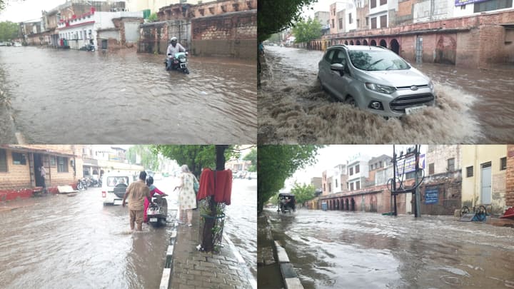 Jodhpur Rain News: जोधपुर में लगातार दूसरे दिन बारिश हुई, जिससे सड़कें जलमग्न हो गईं. पावटा चौराहा पर बारिश का पानी नहीं निकल पाने के कारण सड़कें तालाब जैसी दिखाई दे रही हैं.