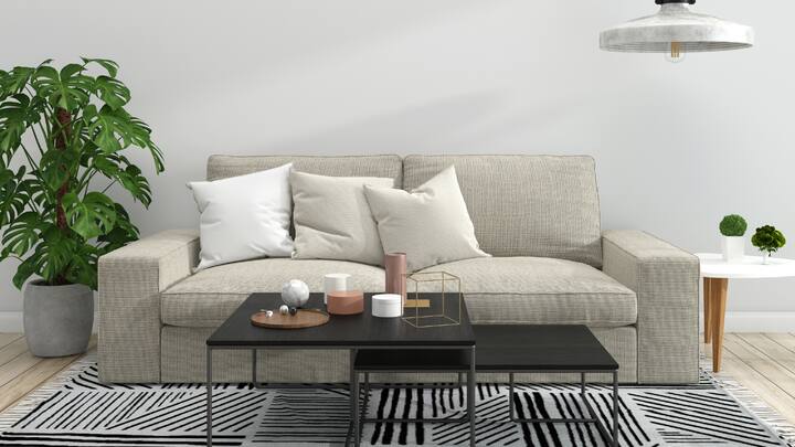 Integrate waterproof and moisture-resistant decor: Monsoon-proofing your living room involves incorporating waterproof or moisture-resistant decor elements alongside aromatic enhancers. Use waterproof cushions, slipcovers, and floor mats to protect your furniture and flooring from dampness, opting for materials that are easy to clean and quick-drying to maintain style and functionality in high humidity. Additionally, combat musty odours with scented candles or essential oil diffusers, choosing fragrances like eucalyptus, lavender, and citrus to keep your living room smelling fresh and invigorating. These scents not only enhance the ambiance but also have calming properties, ensuring your living room remains resilient to the season's challenges while providing a welcoming and comfortable atmosphere. (Image source: Canva)