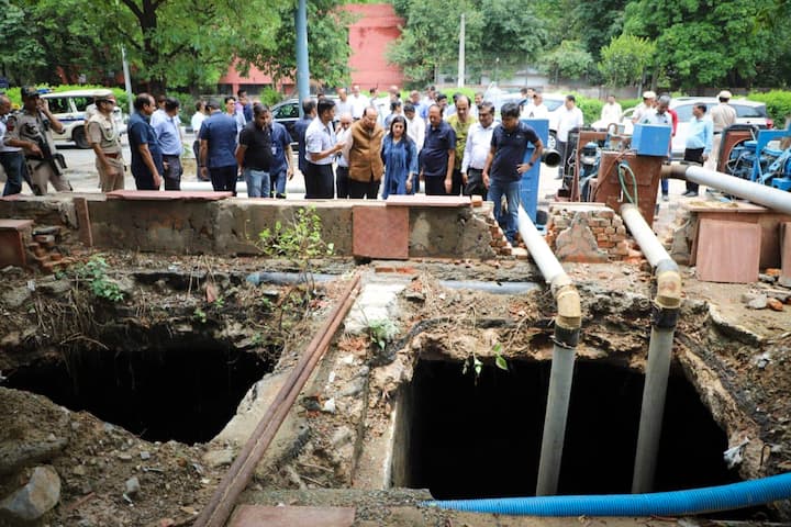 Delhi LG VK Saxena inspects drains that were severely hit by waterlogging following rainfall, in New Delhi, on Saturday, June 29, 2024. (Image source: PTI)