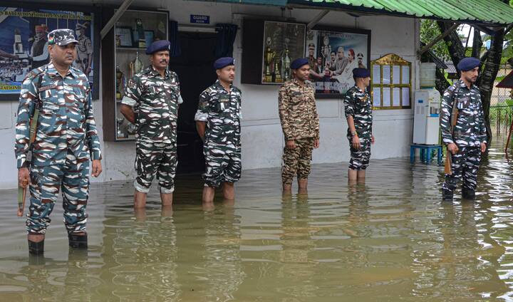 CRPF personnel at their flooded barrack after heavy rainfall, in Dibrugarh, on Saturday, June 29, 2024. (Image source: PTI)