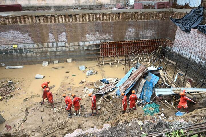 Rescue work underway after a wall at a construction site collapsed amid rain on Friday, at Vasant Vihar area in New Delhi, Saturday, June 29, 2024. At least three labourers were killed, according to officials. (Image source: PTI)