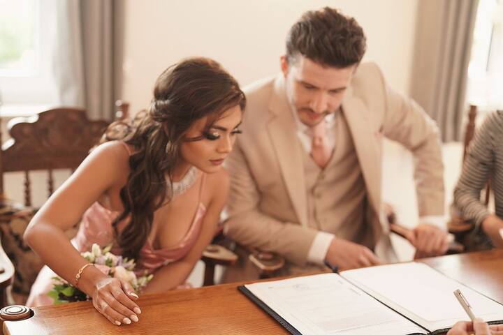 In one of the pictures, the couple can be seen registering their marriage.