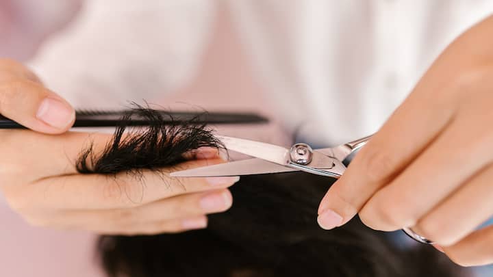 5. Regular Trimming: By taking regular trims, you can easily get rid of split ends while boosting the growth of your hair in the process. Trimming also makes hair more manageable and easy to care for, reducing the chances of frizzy and static hair. Trimming also makes styling easier and helps improve the texture and appearance of hair. (Image source: Canva)