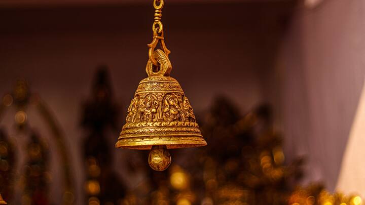 The bell's tone indicates that the divine is present. It is thought to  arouse the god and extend an invitation for them to hear the pleadings of the  faithful.  (Image Source: Canva)