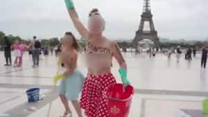 French Feminist Topless Protest Against Fascism Near Eiffel Tower in France  video goes to viral | France Topless protest : एफिल टावर के पास कपड़े उताकर  क्यों प्रदर्शन कर रहीं फ्रांस की
