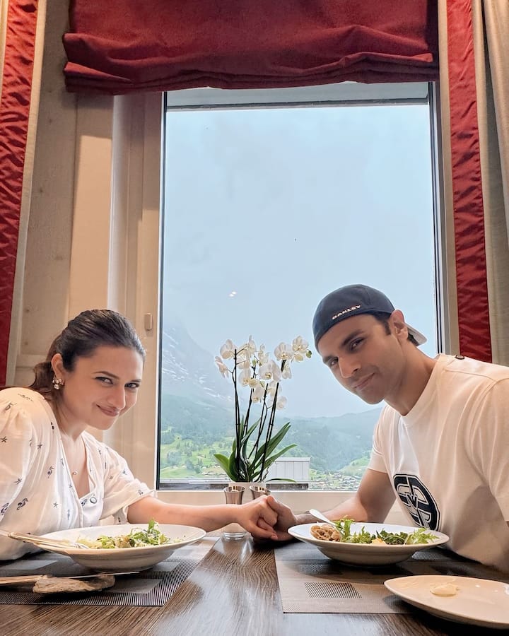 In one of the photos, the couple is seen enjoying their meal together.