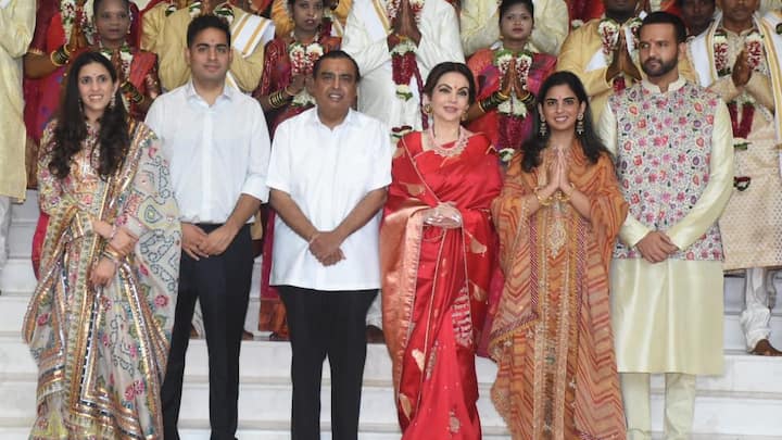 Mukesh Ambani and Nita Ambani were spotted as they arrived at the venue of a mass wedding.