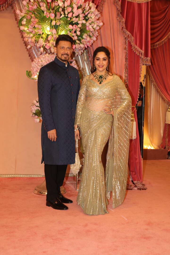 Madhuri Dixit chose a golden saree for the night. She was there with her husband Shriram Nene.