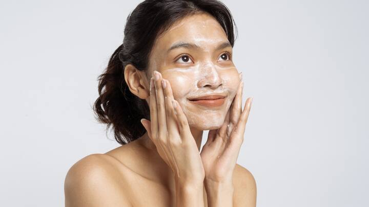 Aim to cleanse your face twice a day, in the morning and at night, to keep it fresh and clean. (Image Source: Canva)