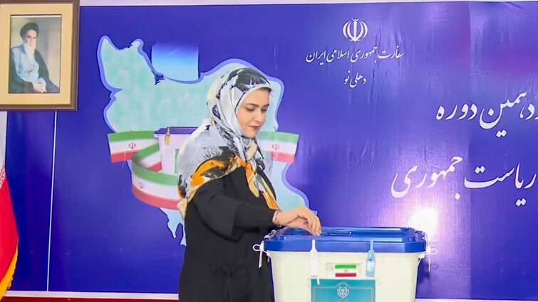 Initial Results Put Moderate Pezeshkian Ahead Of Hard-Liner Jalili In Iran's Presidential Polls: Report