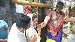 पति के साथ महाकाल के दर्शन करने पहुंचीं मीरा चोपड़ा, परिवार के लिए मांगा आशीर्वाद