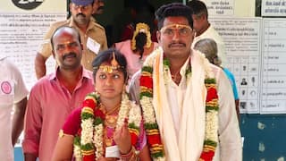 Vikravandi By-Election bride voted with her hand after the wedding - TNN திருமணம் முடிந்த கையோடு வாக்களித்த மணப்பெண் - விக்கிரவாண்டி இடைத்தேர்தலில் சுவாரஸ்யம்