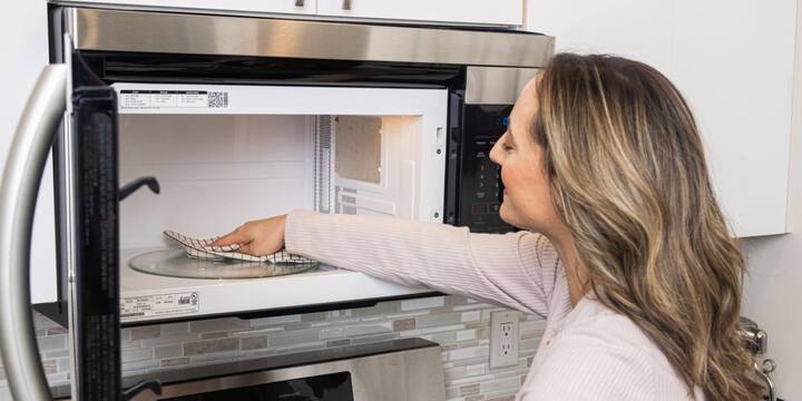 Mix baking soda and water and microwave the paste for 5 to 10 minutes, then clean the area with a soft sponge.