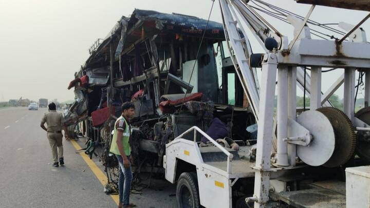Mangled remains of the bus being towed away from the accident site. PM Modi announced an ex gratia payment of Rs 2 lakh for the families of the deceased. (Photo: PTI)