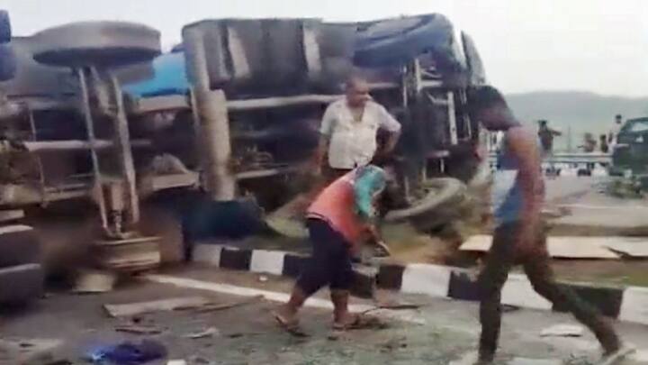 People gathered at the accident site. Many bus passengers were asleep at the time of the crash. (Photo: PTI)