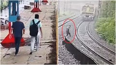 Father-Son Walk On Railway Tracks Holding Hands, Lie Down In Front Of Train. Video Viral