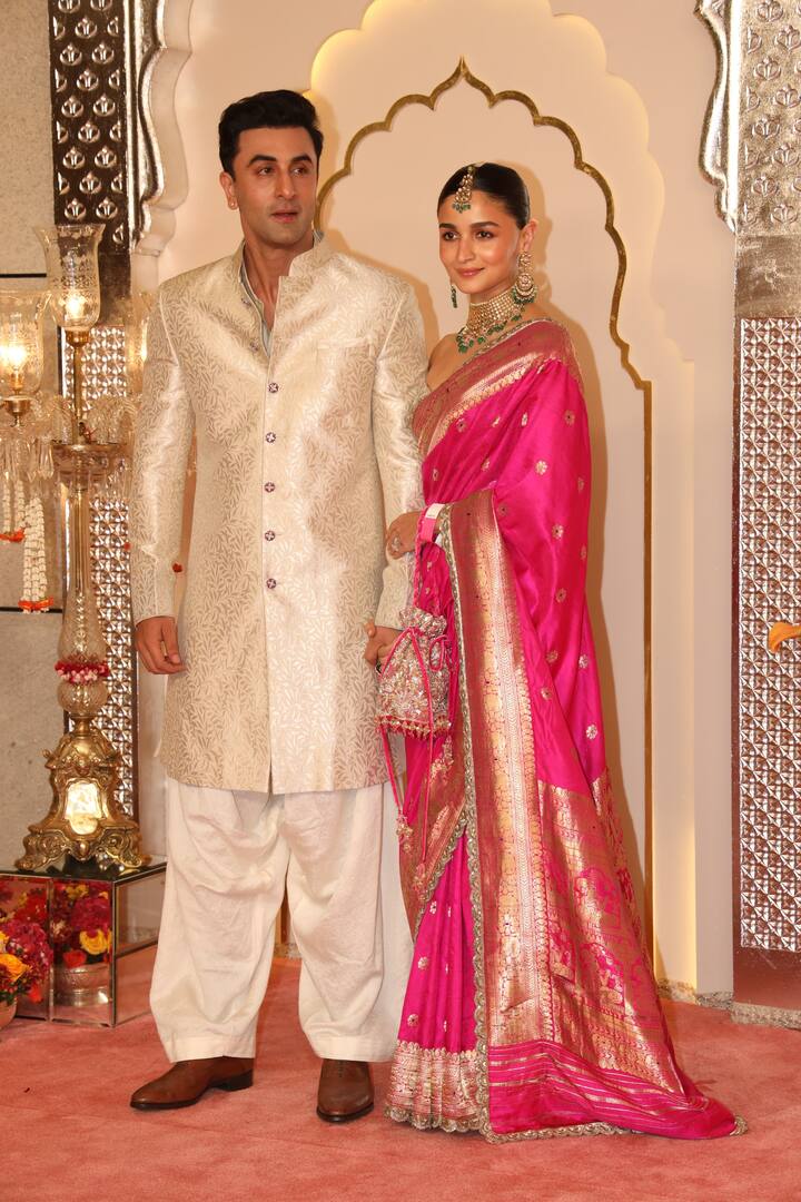 Alia Kapoor looked pretty in pink as she arrived with husband Ranbir Kapoor.