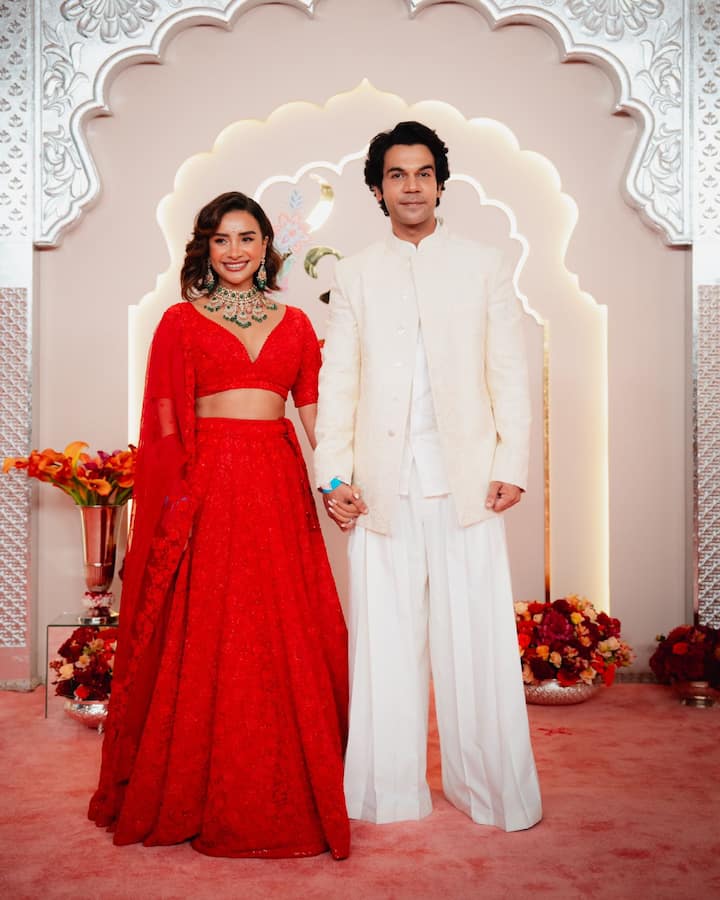 Rajkummar Rao and Patralekha pose for the photos.