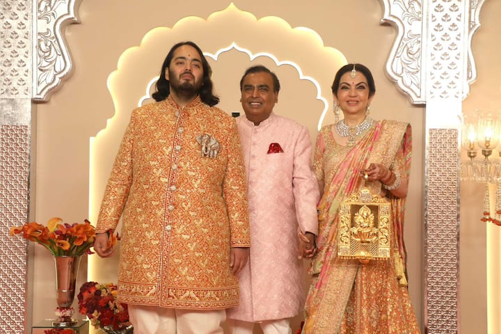 The Ambani family was garbed in designer outfits by Abu Jani Sandeep Khosla and Manish Malhotra for the wedding ceremony of Anant and Radhika. All the outfits were colour-coordinated in shades of pink, gold and red. (Image Source: Special Arrangement)