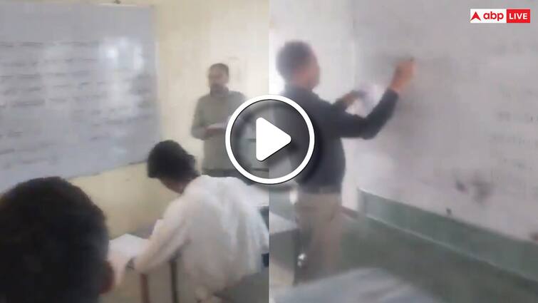 Rajasthan Board 10th Open Exam teacher making students cheat by locked school gate In Phalodi Video Viral ANN Watch: राजस्थान में स्कूल गेट पर ताला लगाकर गुरुजी करा रहे थे नकल, विजिलेंस टीम पहुंची तो उड़ीं हवाइयां