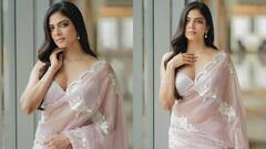 Malavika Mohanan Photos : மெழுகு சிலை போல் காட்சியளிக்கும் மாளவிகா மோகனன்!