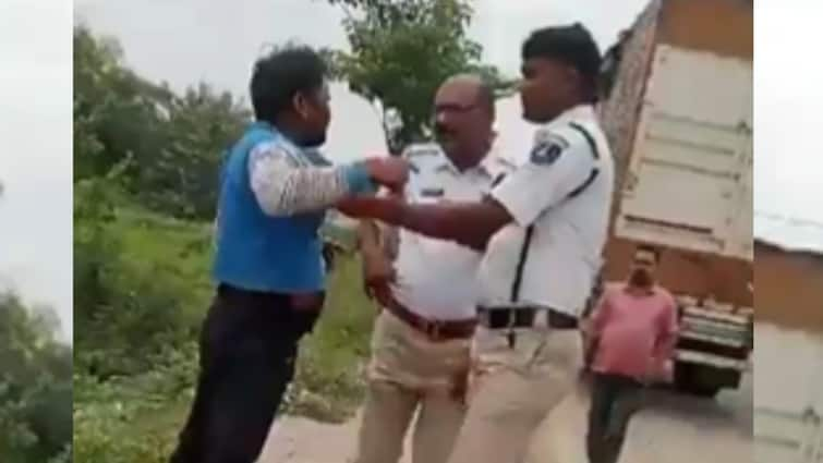 Telangana Cop Slaps Lorry Driver Viral Video Shows KTR BRS Reacts Disciplinary Action Initiated Transferred Viral Video Shows Telangana Cop 'Slapping' Lorry Driver, Disciplinary Action Initiated