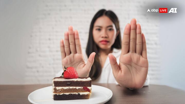 4. Limit Acidic and Sugary Foods: Foods and drinks high in acid or sugar can erode enamel and increase sensitivity. Cut back on these and rinse your mouth with water after consuming them. (Image Source: ABP Live AI)