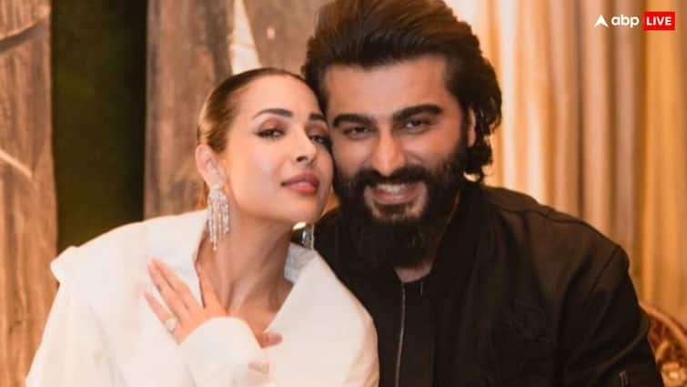 Malaika Arora enjoying Vacation In Spain her Pics Viral with a mystery man amid  Breakup Rumours with Arjun Kapoor अर्जुन कपूर से ब्रेकअप के बाद अब किसे डेट कर रही हैं Malaika Arora? दिखाई फ़ोटो