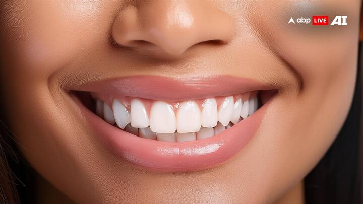 3. Stick to Good Oral Hygiene: Brush twice a day and floss regularly to keep your mouth free from bacteria that cause tooth decay and gum disease. While following the ritual, pay extra attention to where your gum meets your tooth. (Image Source: ABP Live AI)