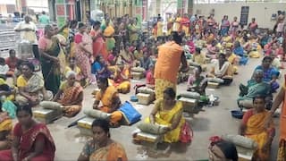 Aadi Festival 2024 Sivagangai Devotees grind turmeric in Ammi pray for amman - TNN Aadi Festival 2024: ஆடி முதல் வெள்ளி... 301 கிலோ மஞ்சள், 51 அம்மியில் மஞ்சள் அரைத்து காரைக்குடி பக்தைகள் வழிபாடு