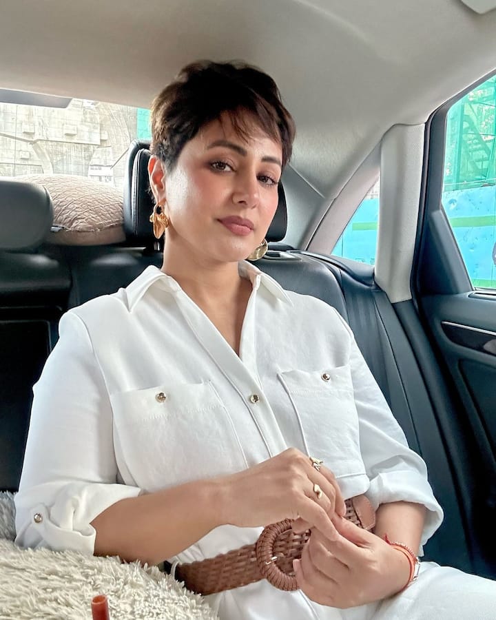 The star shared a bunch of photos of herself in a white dress while seated in a car.