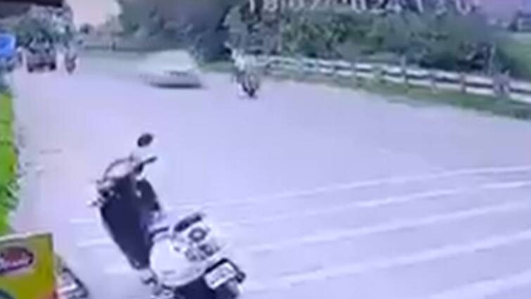 Pune City News Couple Escapes Death After Speeding Car Flungs Them Into Air Video Catches Pune Couple's Brush With Death On Ahmednagar-Kalyan Highway