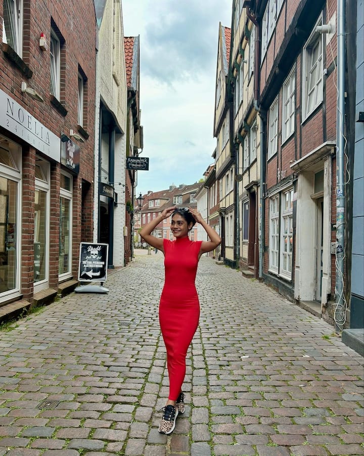 Sreejita wore an orange bodycon dress and looked dapper as ever