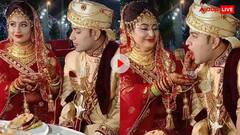 दुल्हन ने गुलाब जामुन खिलाया तो दूल्हे ने फाड़ दिया पूरा मुंह, यूजर्स बोले- जन्म से भूखा है बेचारा!