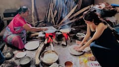 Shraddha Das : కట్టెల పొయ్యిపై రోటీలు చేస్తున్న శ్రద్ధాదాస్.. మోడ్రన్​ డ్రెస్​లో కిచెన్​లో హీట్​ పెంచేస్తోందిగా